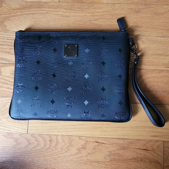 MCM Handbags - Authentic MCM Black Clutch